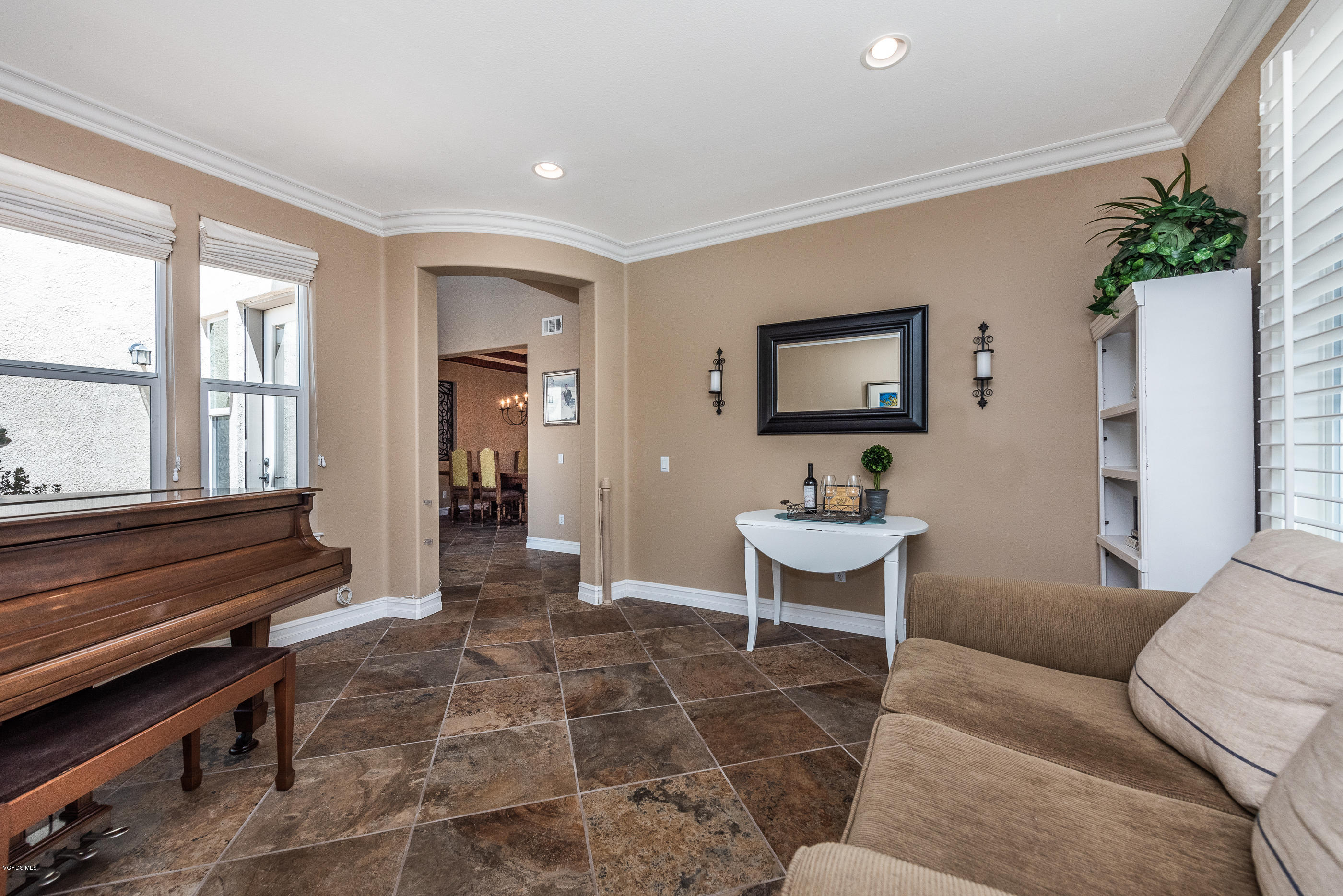 1469 Hidden Ranch Drive Simi Valley, CA 93063 - Photo 13 of 49 a living room with furniture a window and a table
