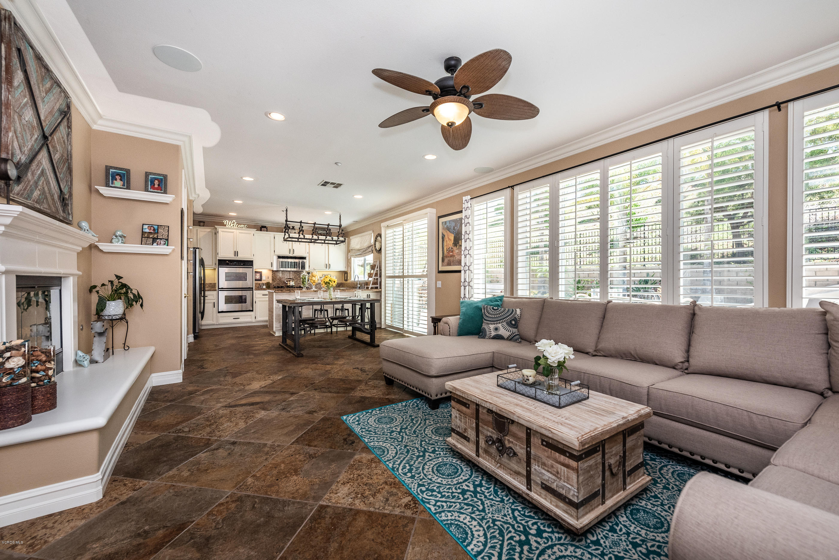 1469 Hidden Ranch Drive Simi Valley, CA 93063 - Photo 14 of 49 a living room with furniture a fireplace and a large window