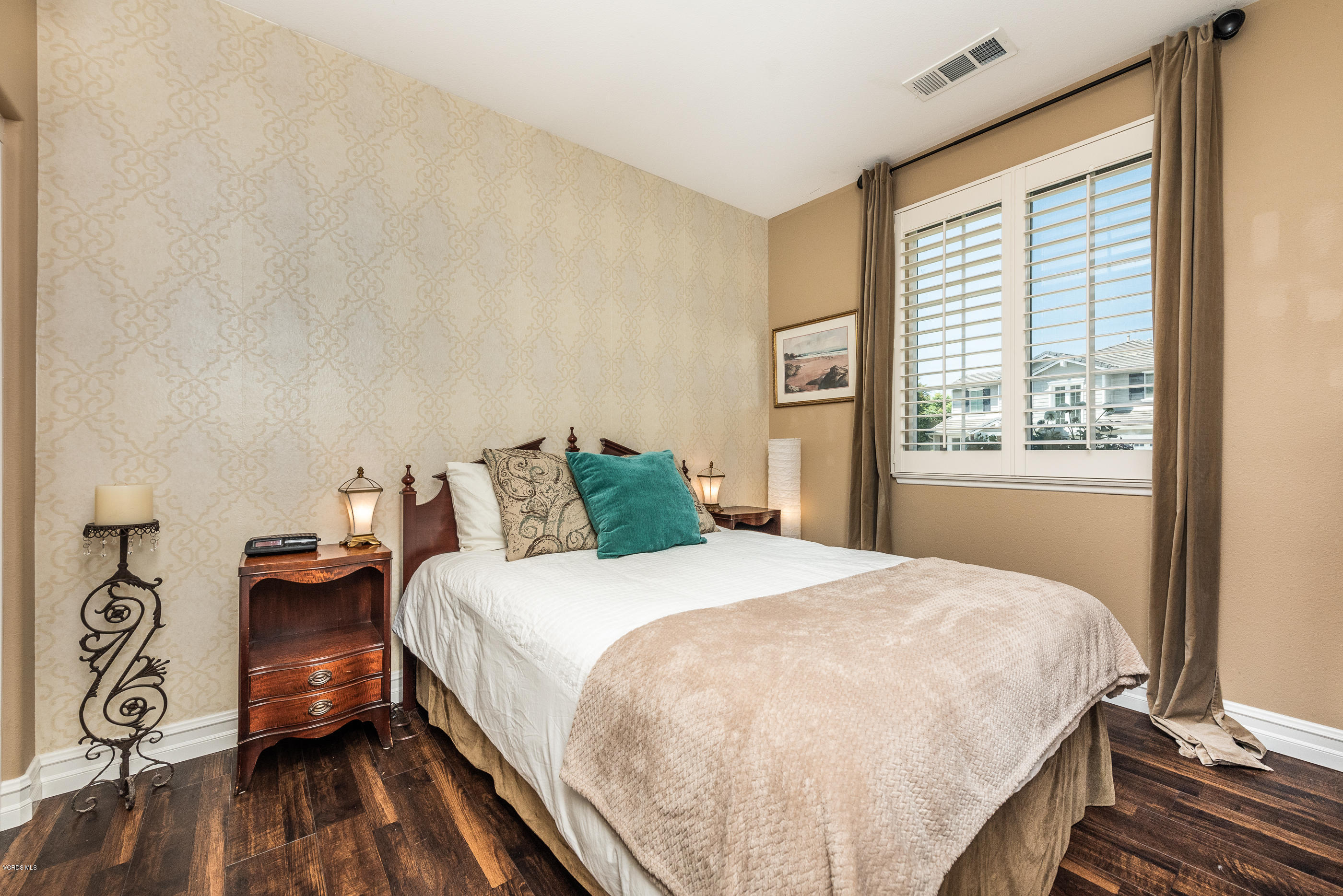 1469 Hidden Ranch Drive Simi Valley, CA 93063 - Photo 23 of 49 a bedroom with a bed and wooden floor