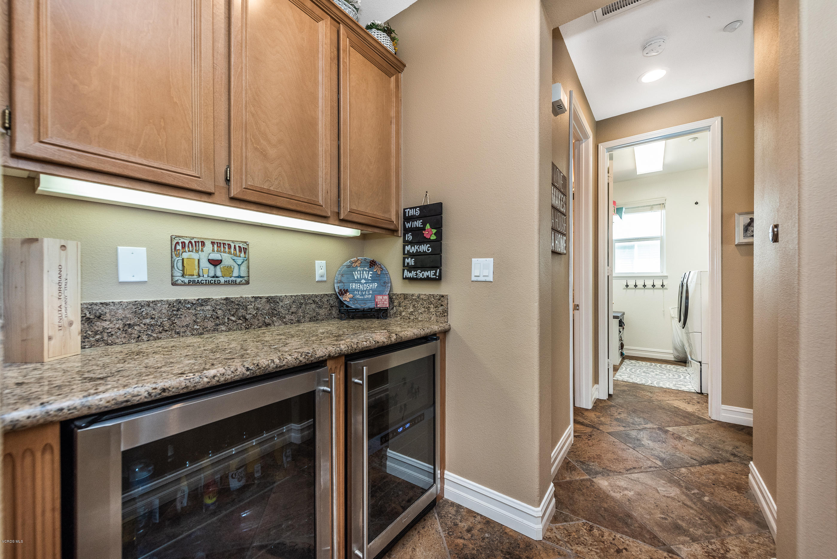 1469 Hidden Ranch Drive Simi Valley, CA 93063 - Photo 24 of 49 a kitchen with stainless steel appliances granite countertop a refrigerator and a sink