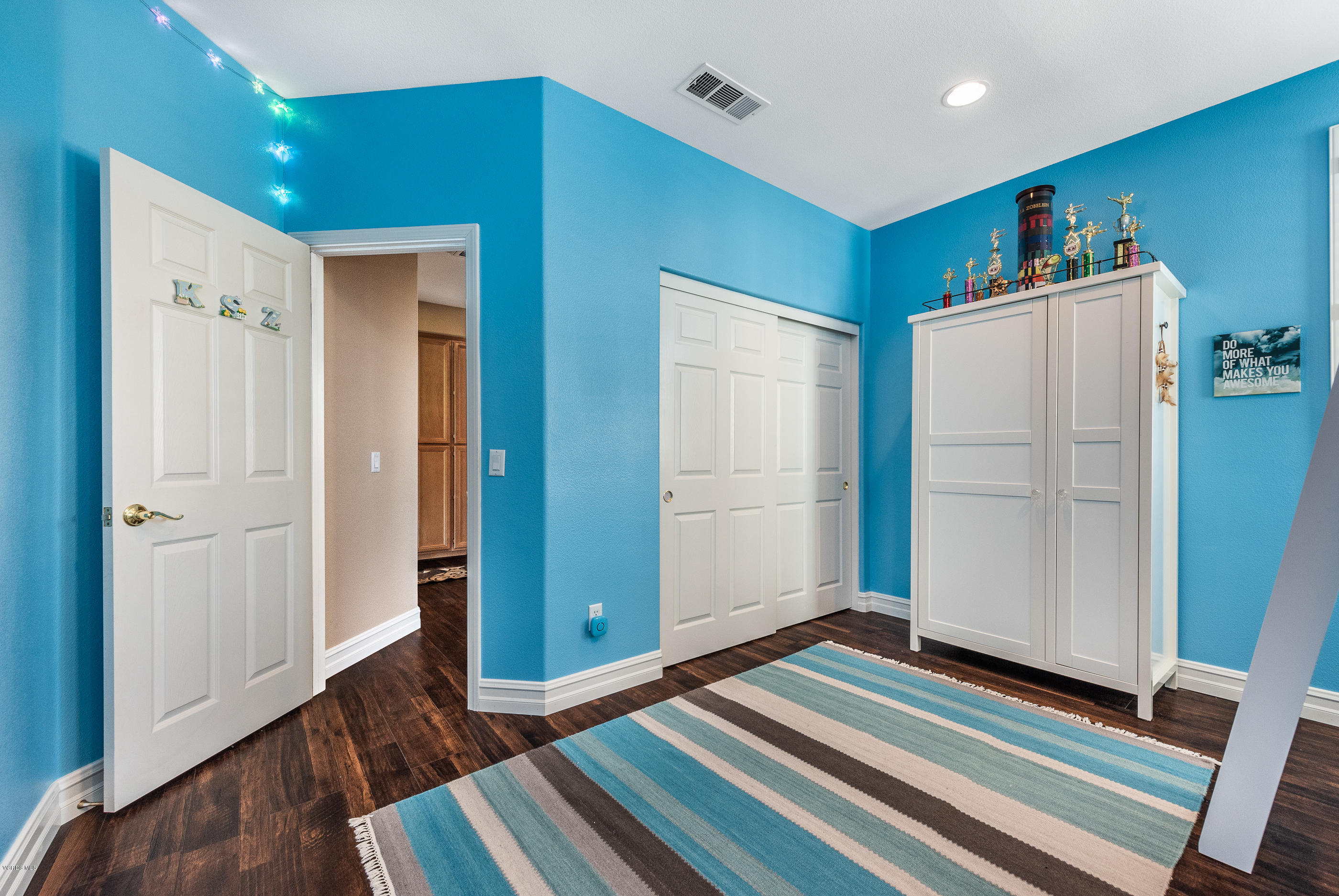 1469 Hidden Ranch Drive Simi Valley, CA 93063 - Photo 36 of 49 a view of a hardwood floor and an empty room