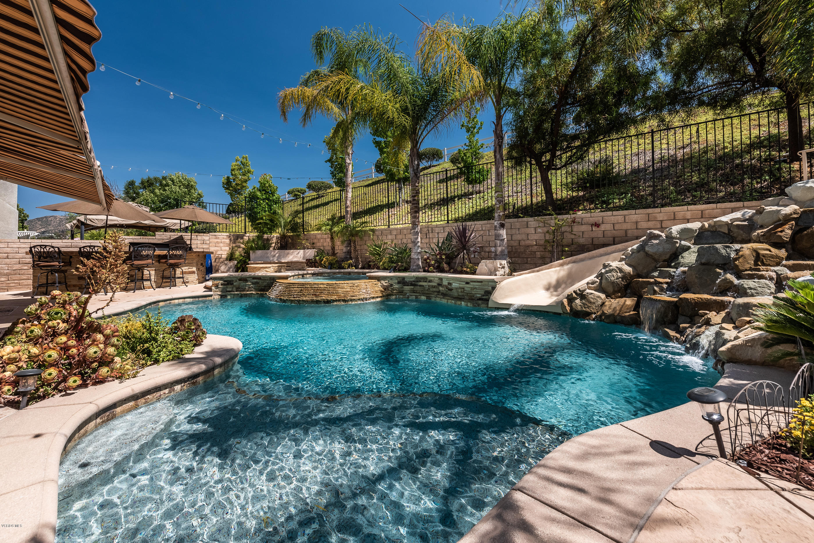 1469 Hidden Ranch Drive Simi Valley, CA 93063 - Photo 43 of 49 a backyard of a house with lots of green space