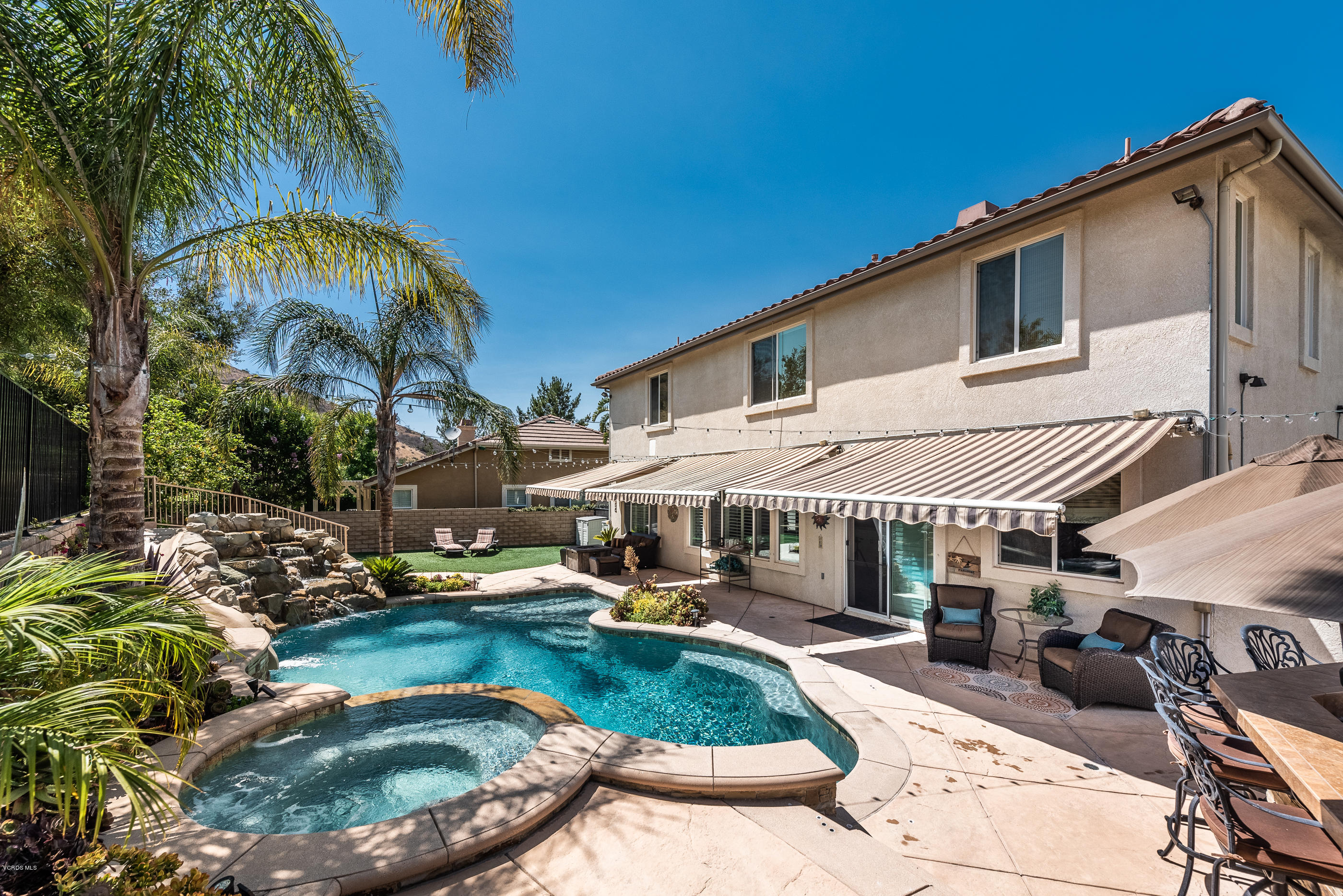 1469 Hidden Ranch Drive Simi Valley, CA 93063 - Photo 44 of 49 a swimming pool with outdoor seating and yard