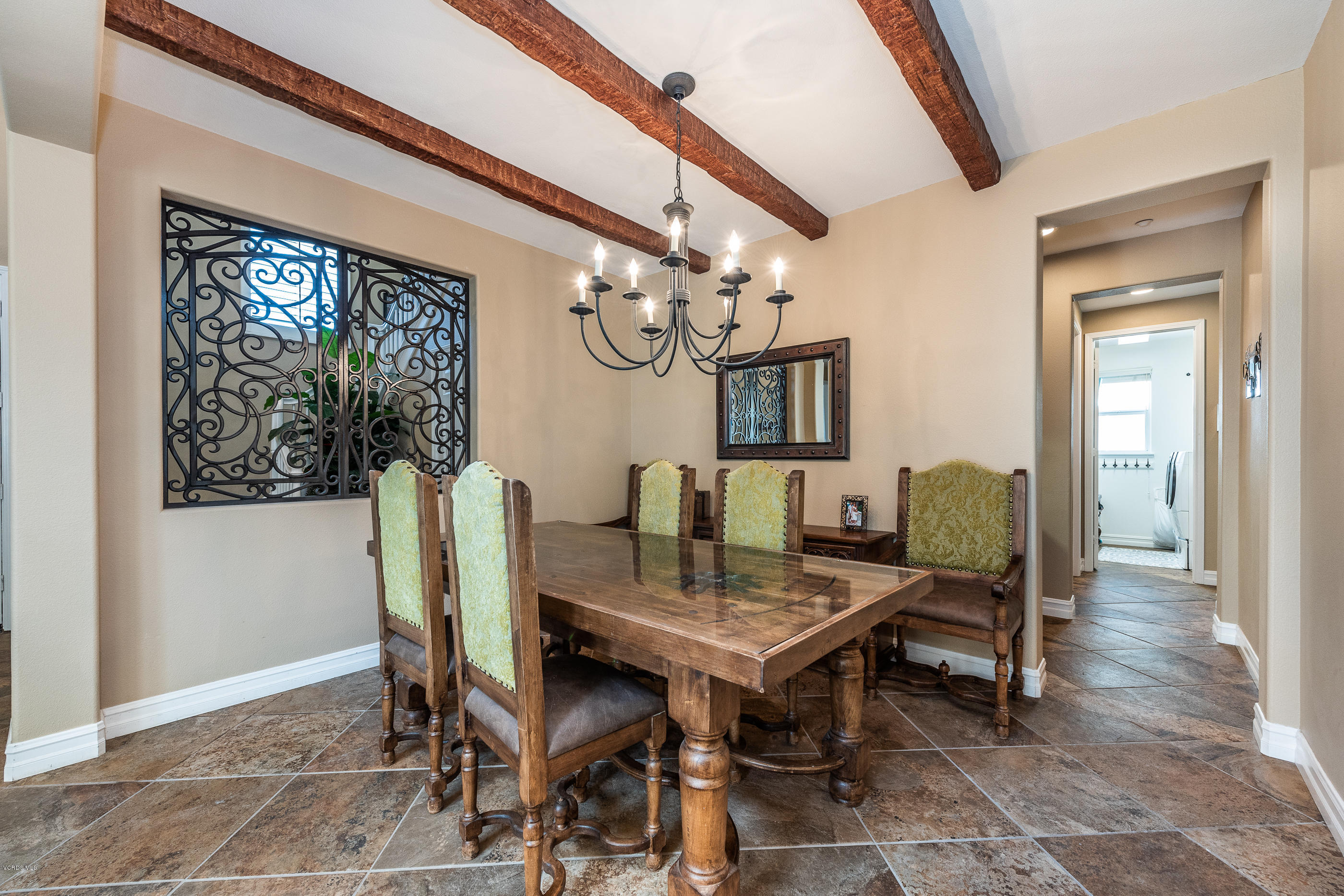 1469 Hidden Ranch Drive Simi Valley, CA 93063 - Photo 10 of 49 a view of a dining room with furniture and a chandelier