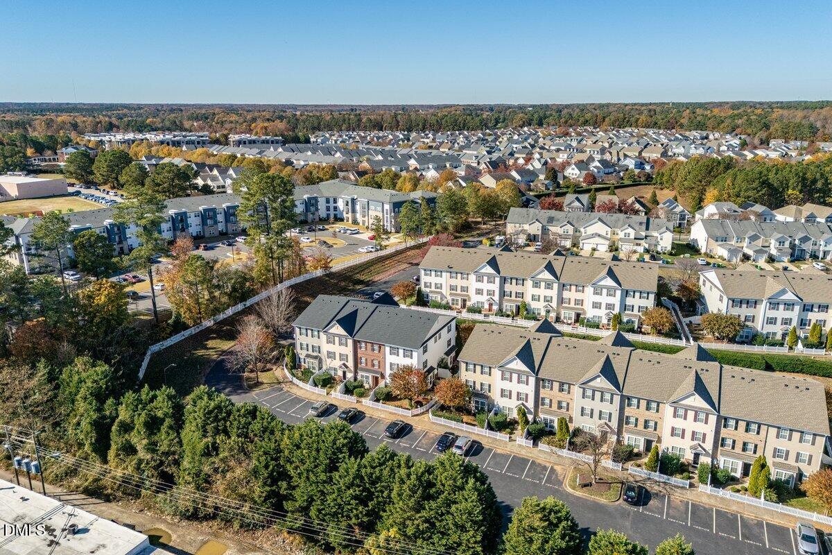 an aerial view of a city with lots of residential buildings