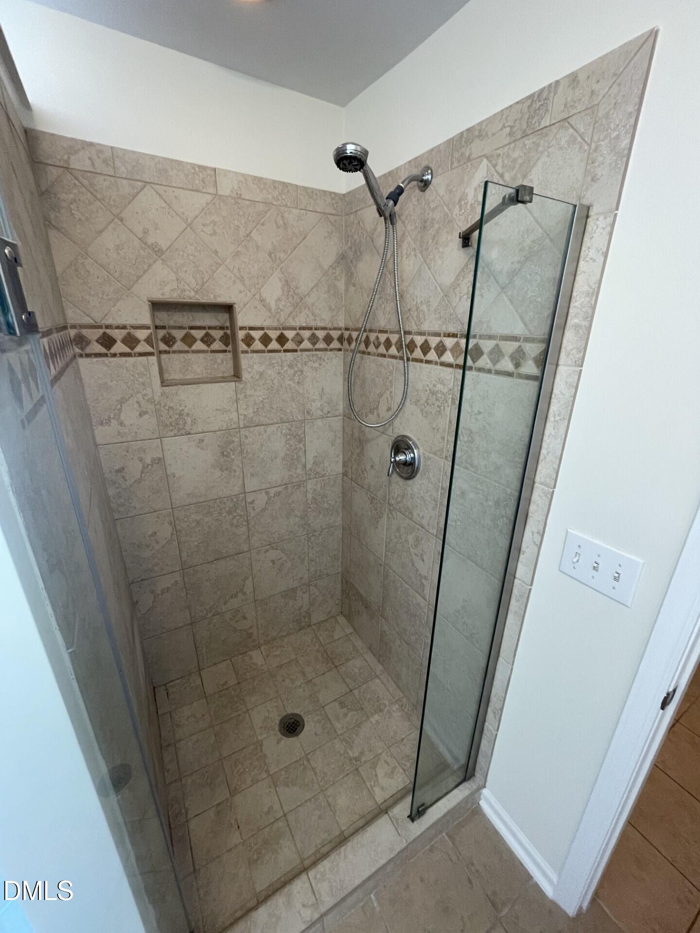 1130 Renewal Place, Unit 100 Raleigh, NC 27603 - Photo 10 of 17 a bathroom with a shower