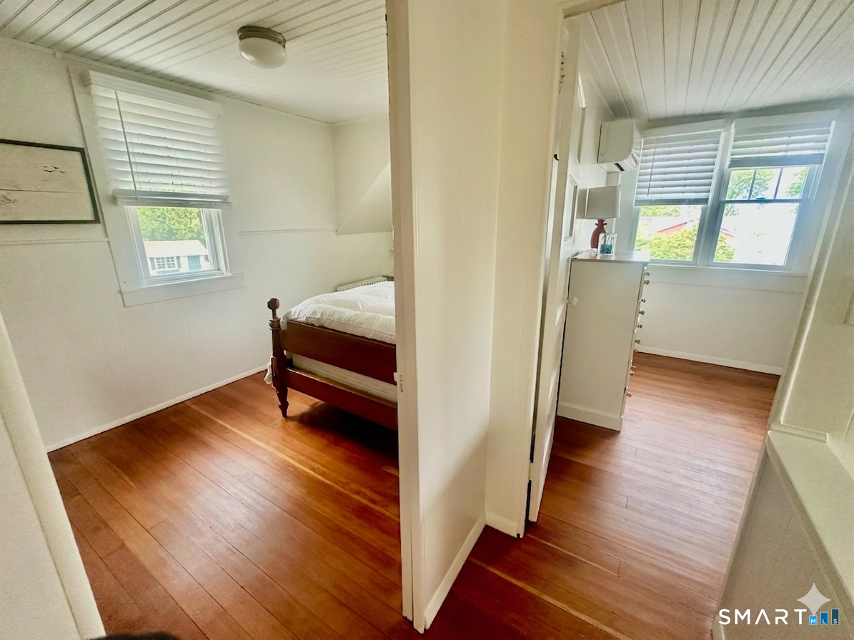 36 Attawan Road East Lyme, CT 06357 - Photo 27 of 40 Looking into Bedroom 2 (Right) and Bedroom 3 (Left). Water Views from the 2 Bedrooms.