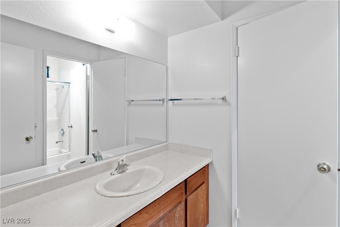 3740 Desert Marina Drive, Unit 2 Laughlin, NV 89029 - Photo 24 of 75 Bathroom featuring vanity and bathtub / shower combination