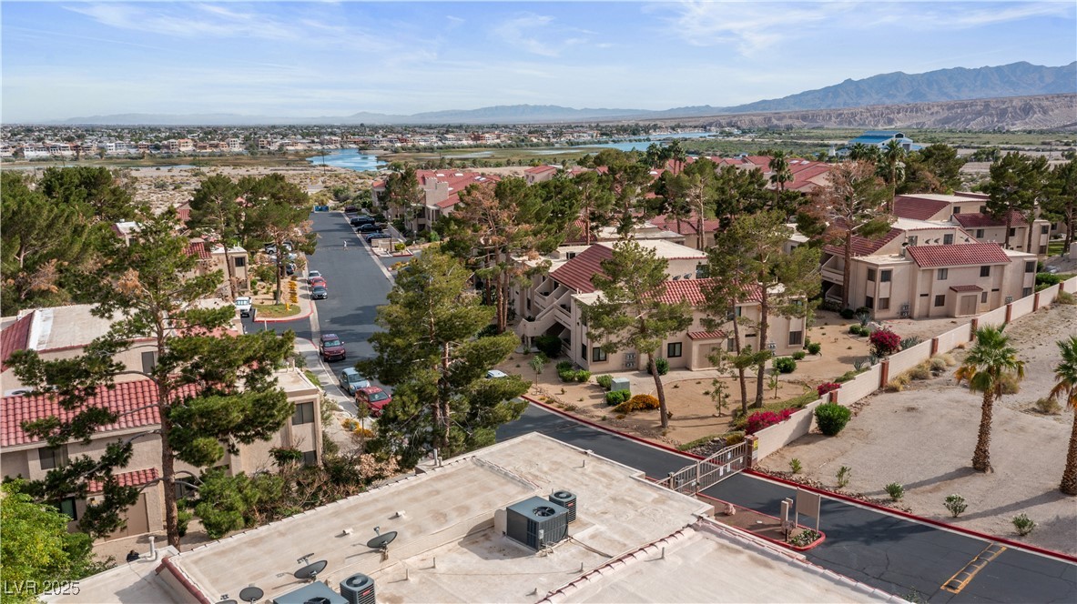3740 Desert Marina Drive, Unit 2 Laughlin, NV 89029 - Photo 42 of 75 Aerial perspective of suburban area with a water and mountain view