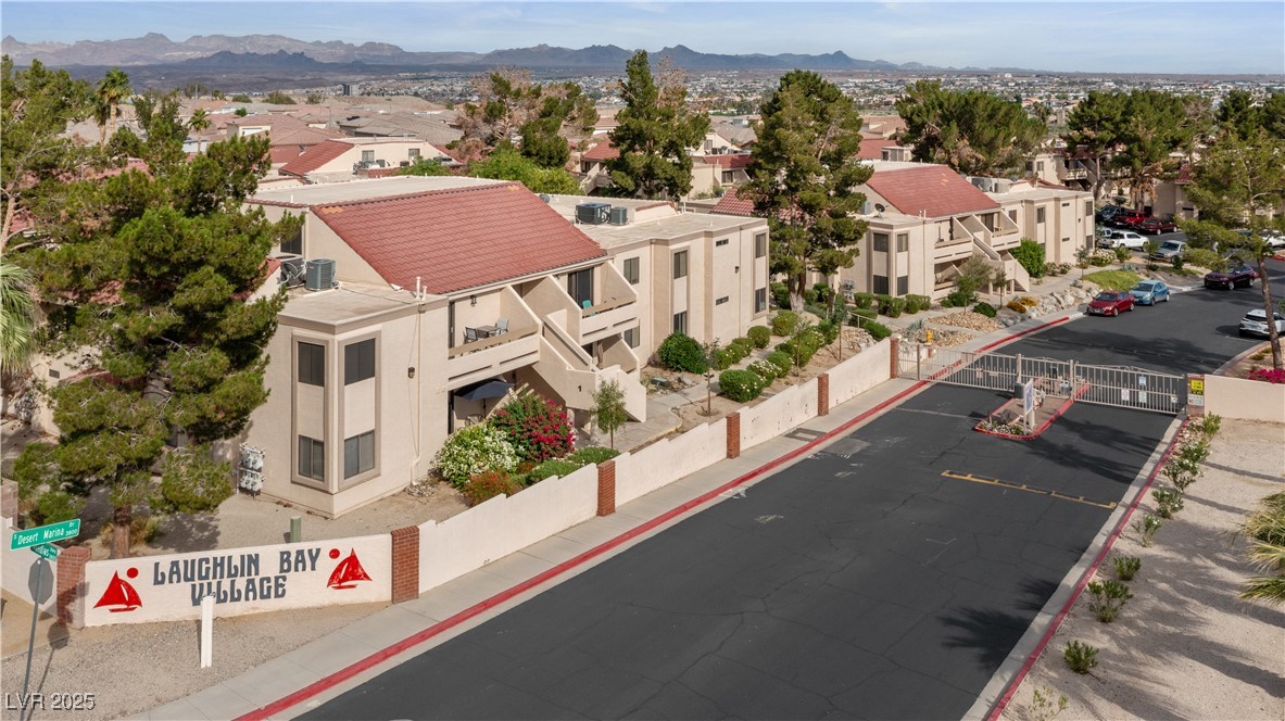 3740 Desert Marina Drive, Unit 2 Laughlin, NV 89029 - Photo 44 of 75 Aerial perspective of suburban area featuring mountains