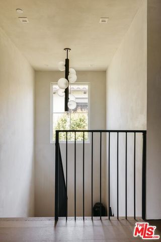 a bedroom with bed and a fireplace