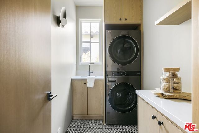 a bedroom with a bed and a table in it