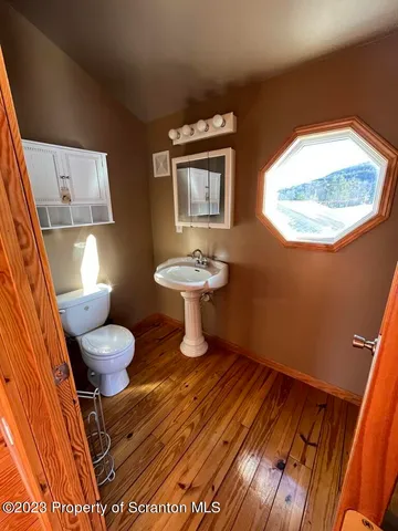 a room with furniture and a flat screen tv