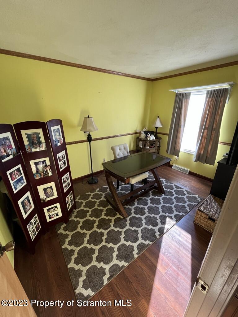 14651 Highway 858 Little Meadows, PA 18830 - Photo 34 of 51 a living room with rug floor and a table