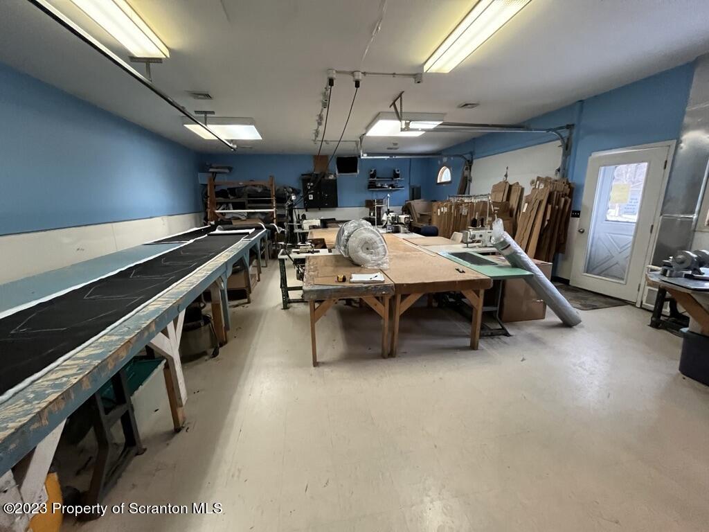 14651 Highway 858 Little Meadows, PA 18830 - Photo 41 of 51 a room with furniture and a flat screen tv