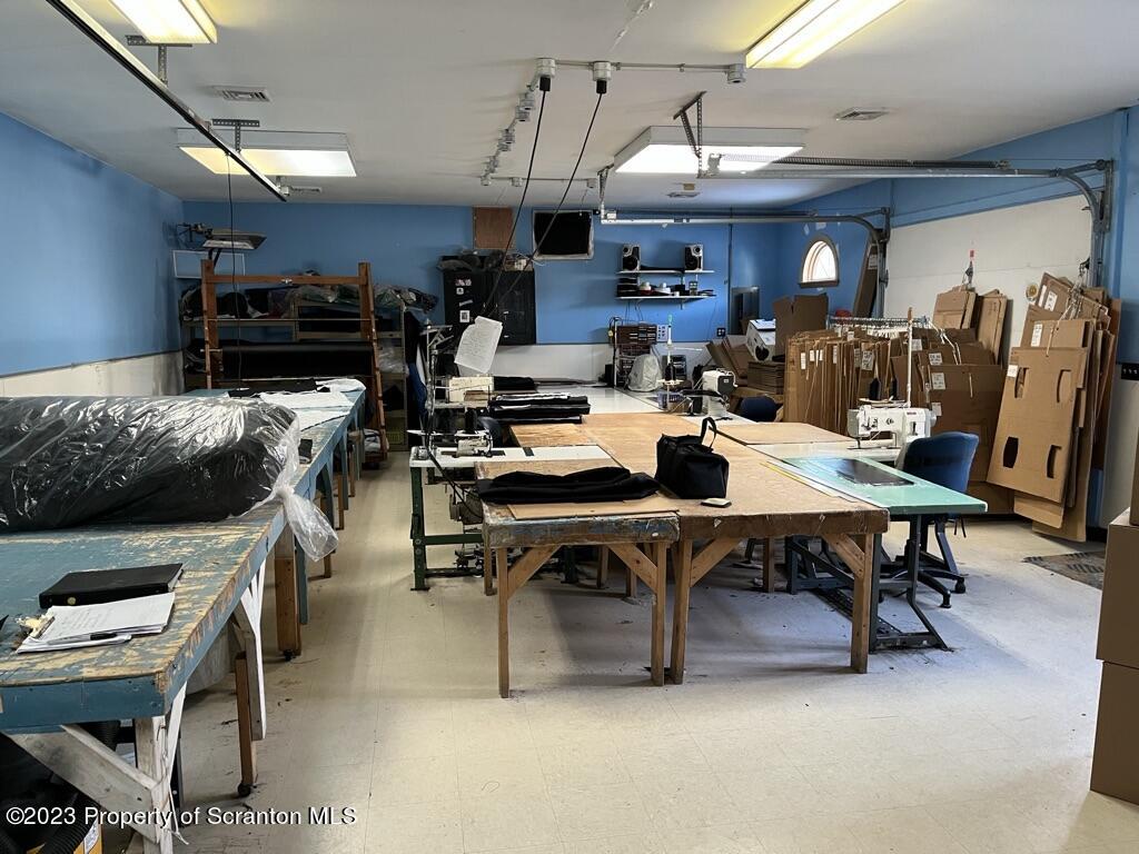14651 Highway 858 Little Meadows, PA 18830 - Photo 42 of 51 a living room with lots of furniture and kitchen view