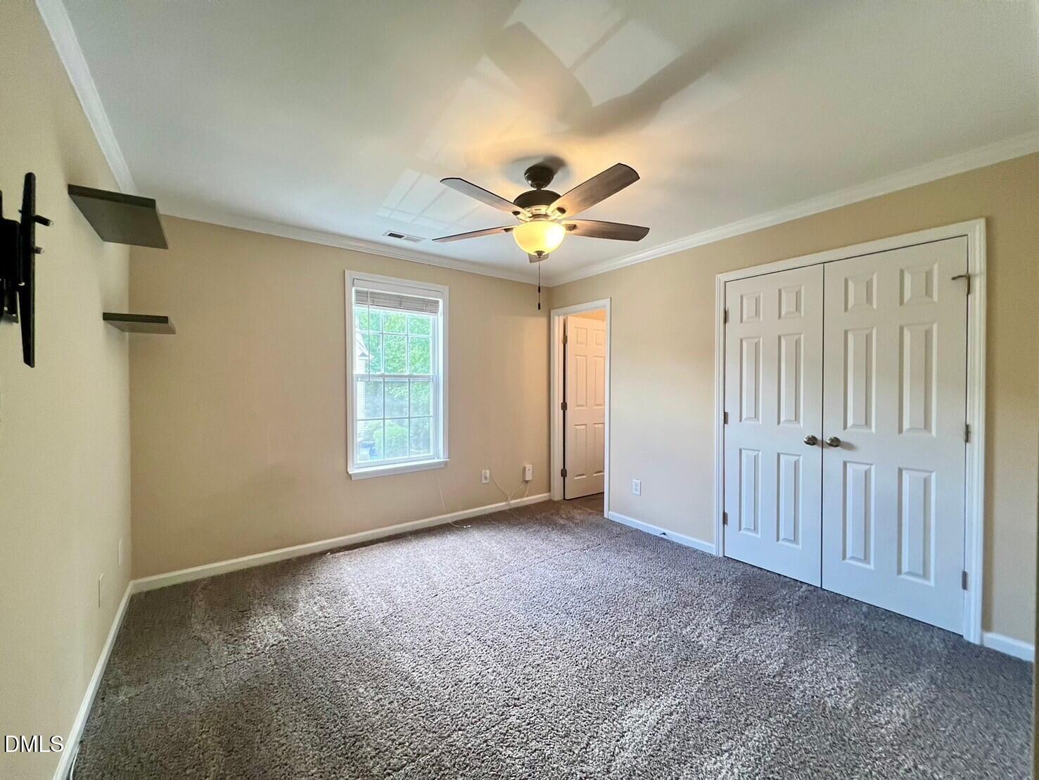9912 Layla Avenue Raleigh, NC 27617 - Photo 20 of 25 a view of an empty room with a window