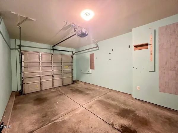 a view of room that has a garage