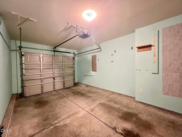 a view of room that has a garage