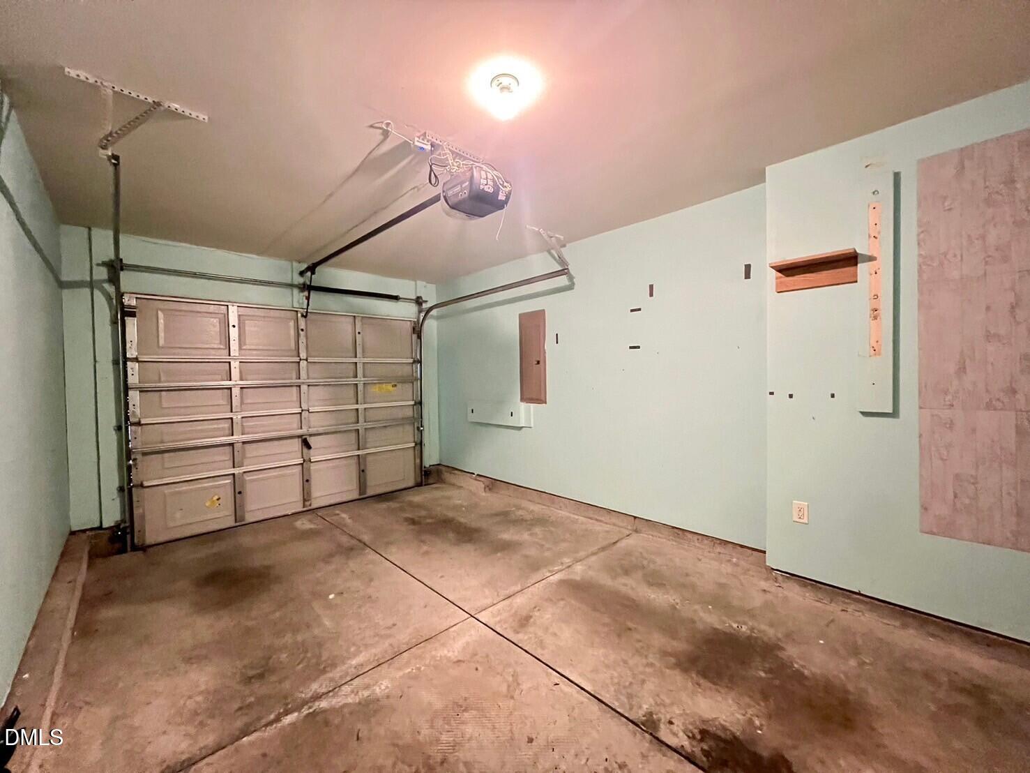 9912 Layla Avenue Raleigh, NC 27617 - Photo 23 of 25 a view of room that has a garage