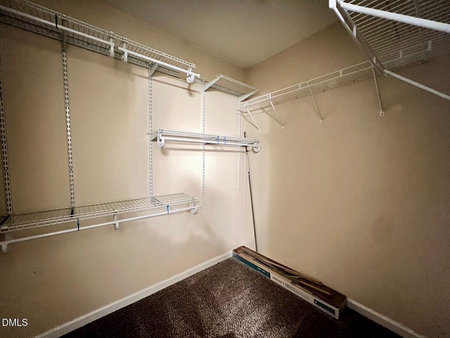 9912 Layla Avenue Raleigh, NC 27617 - Photo 25 of 25 a view of a room with racks on the wall