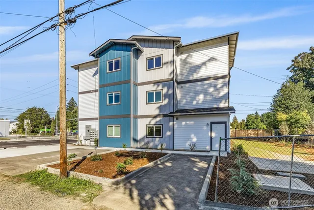 a front view of a house with swimming pool