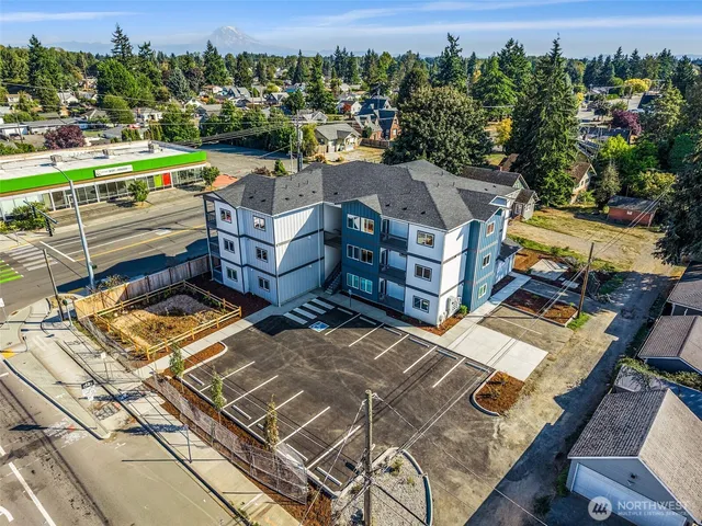 an aerial view of a house with a garden