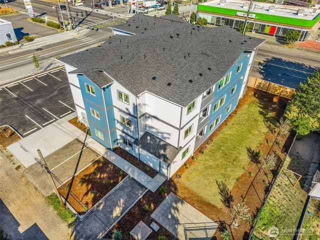 a aerial view of a house with swimming pool