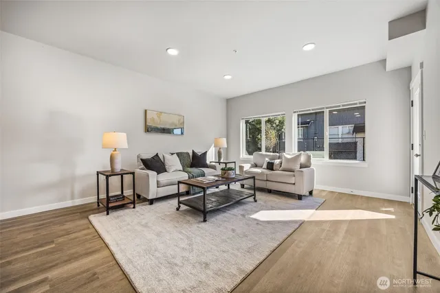 a living room with furniture or couch and a window