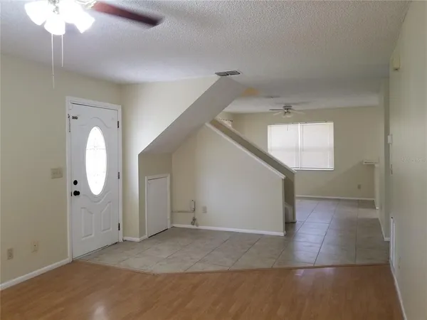 a view of a hallway with entryway