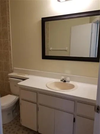 a bathroom with a sink and a toilet