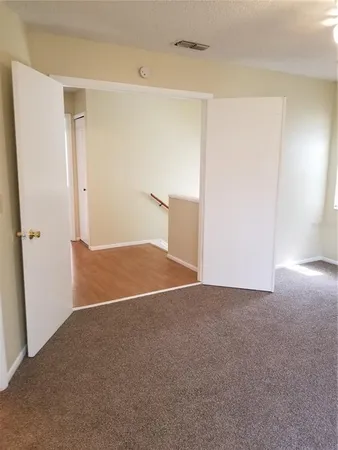 a view of a room with an empty space