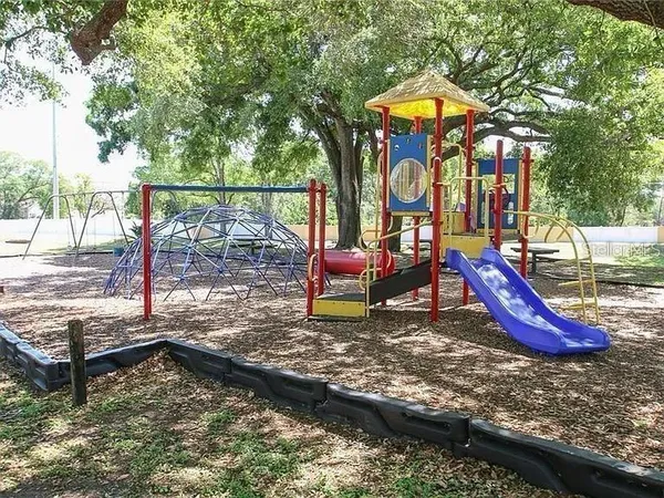 a view of a park with slide