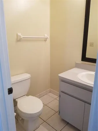 a bathroom with a toilet and a sink