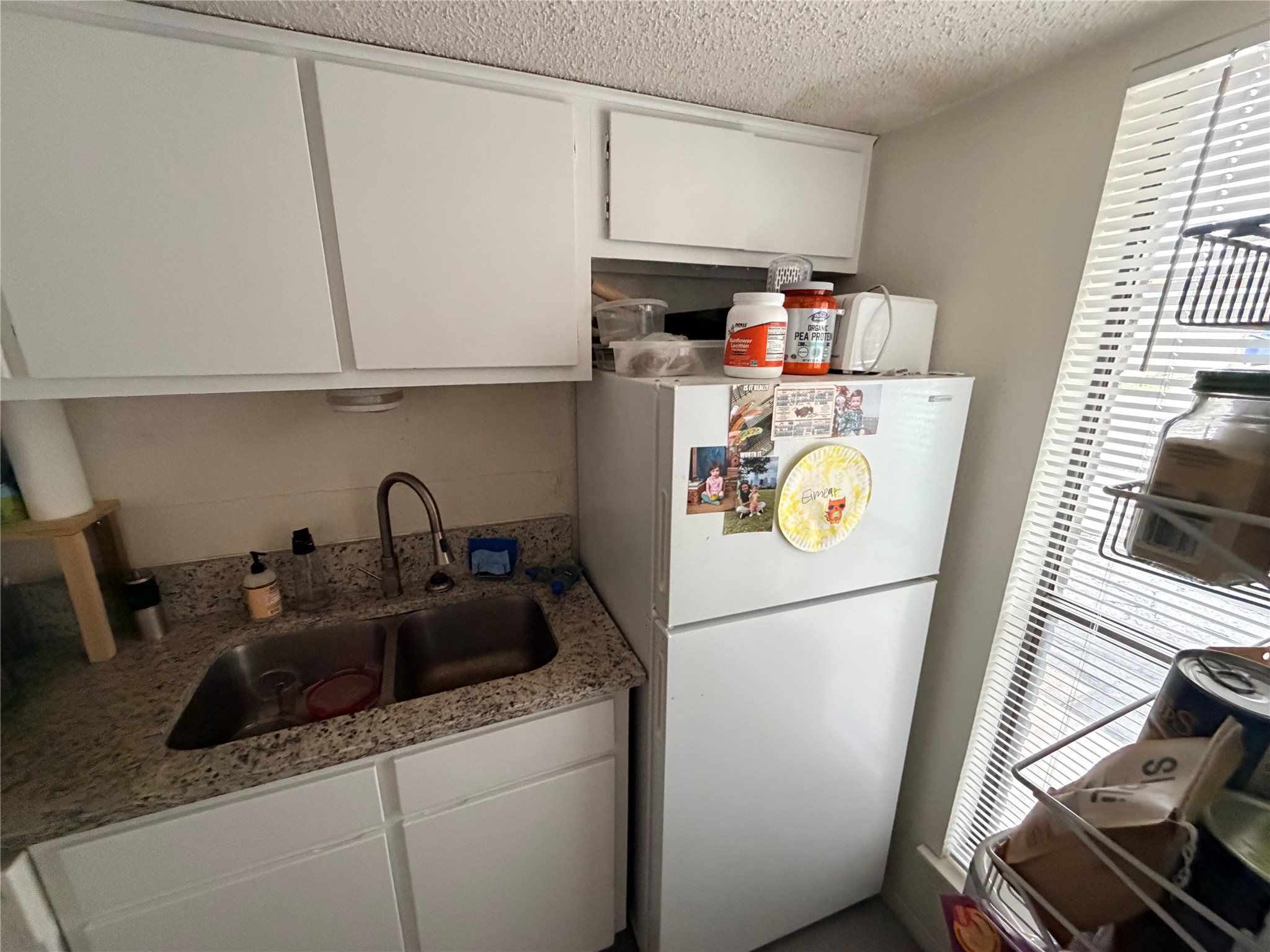 3000 Guadalupe Street, Unit 106 Austin, TX 78705 - Photo 9 of 9 a utility room with dryer and washer