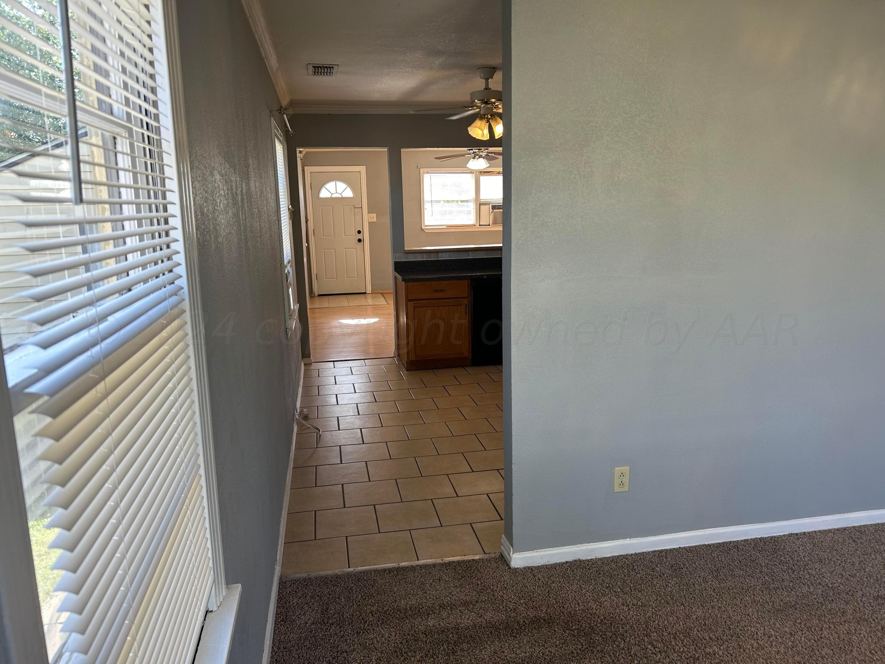 4617 South Lipscomb Street Amarillo, TX 79110 - Photo 4 of 19 into kitchen