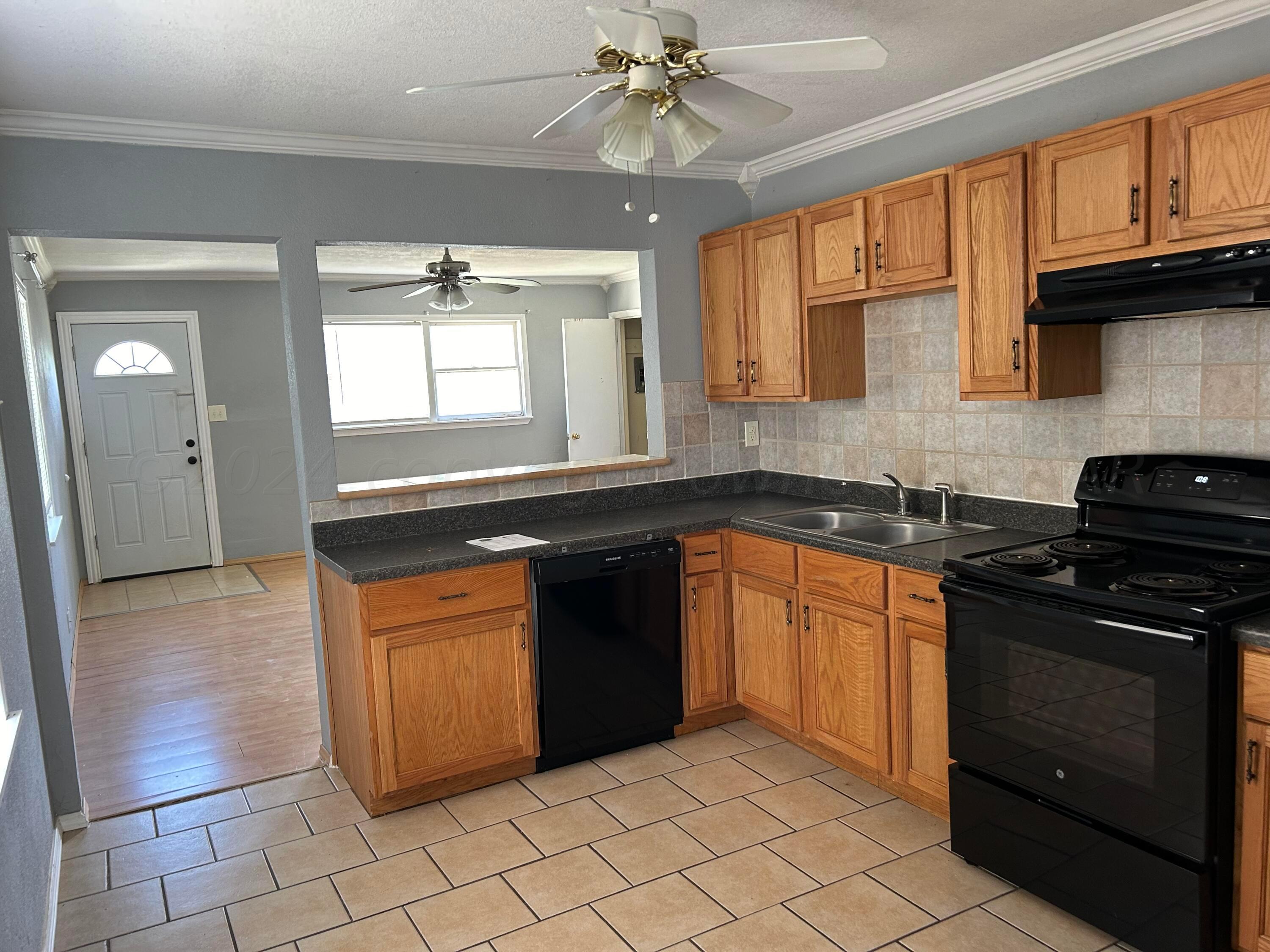 4617 South Lipscomb Street Amarillo, TX 79110 - Photo 8 of 19 Kitchen pass through to 2nd LR