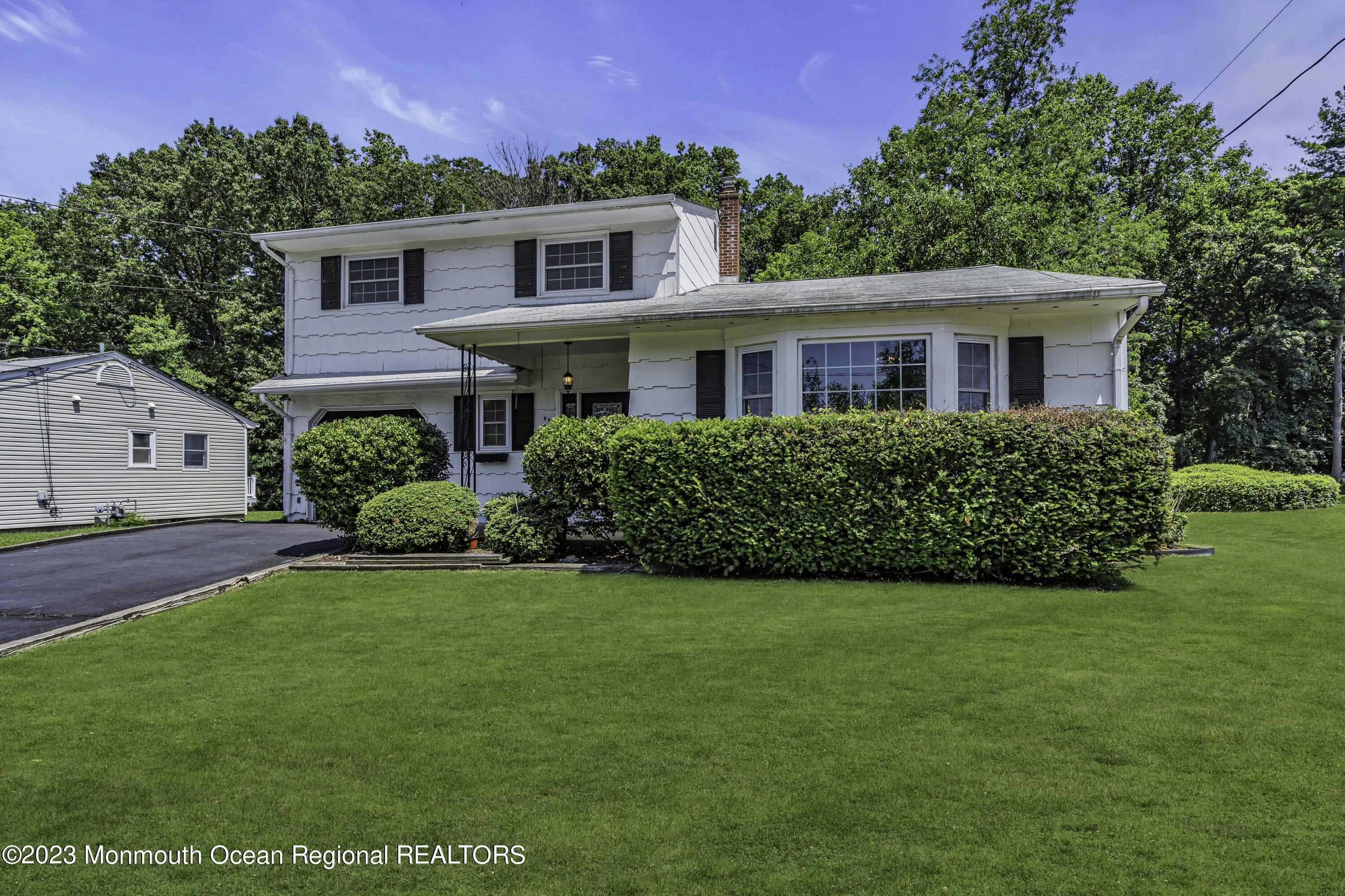 44 Danemar Drive Matawan, NJ 07747 - Photo 1 of 31 a front view of a house with a yard