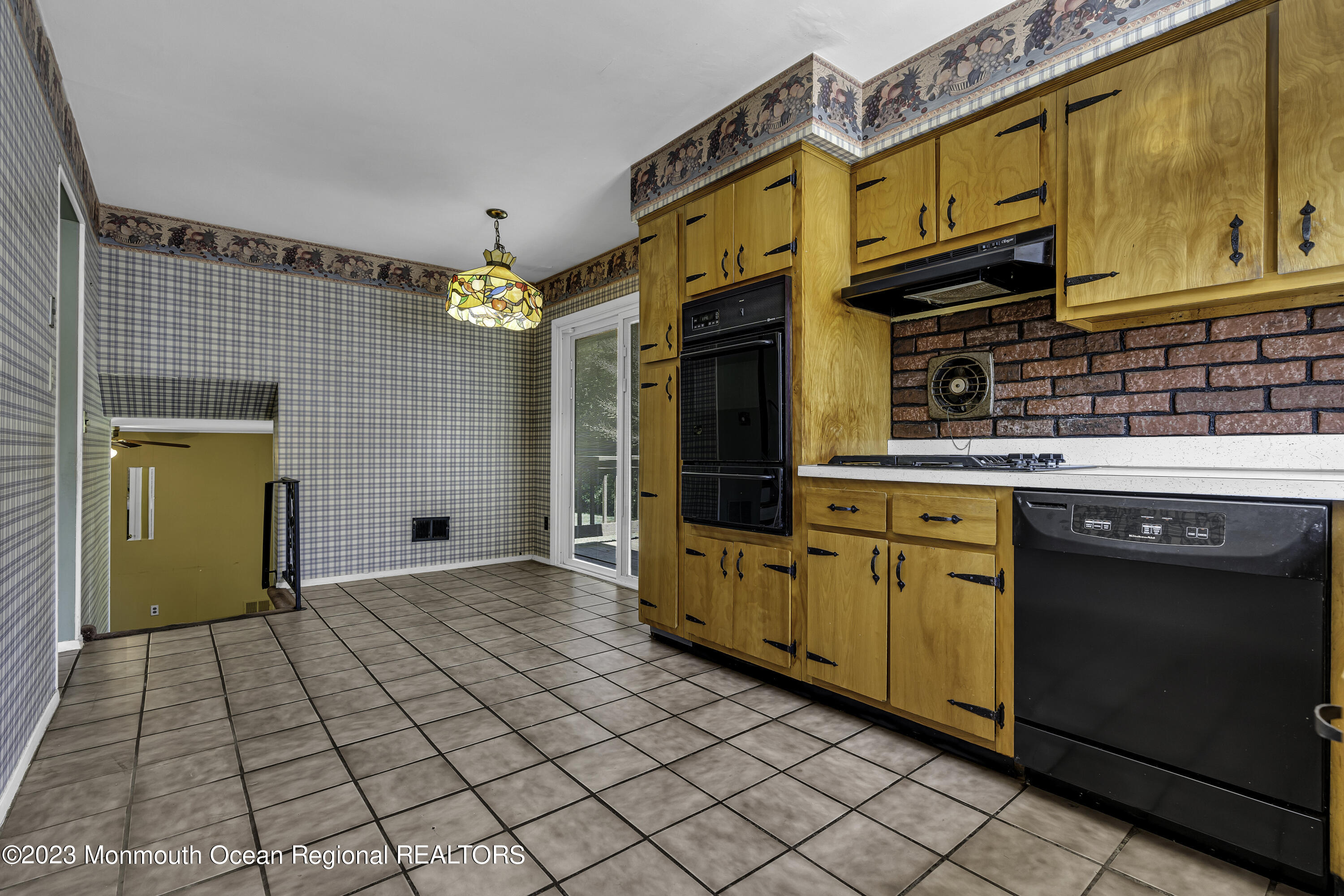 44 Danemar Drive Matawan, NJ 07747 - Photo 11 of 31 a view of a kitchen cabinets and wooden floor