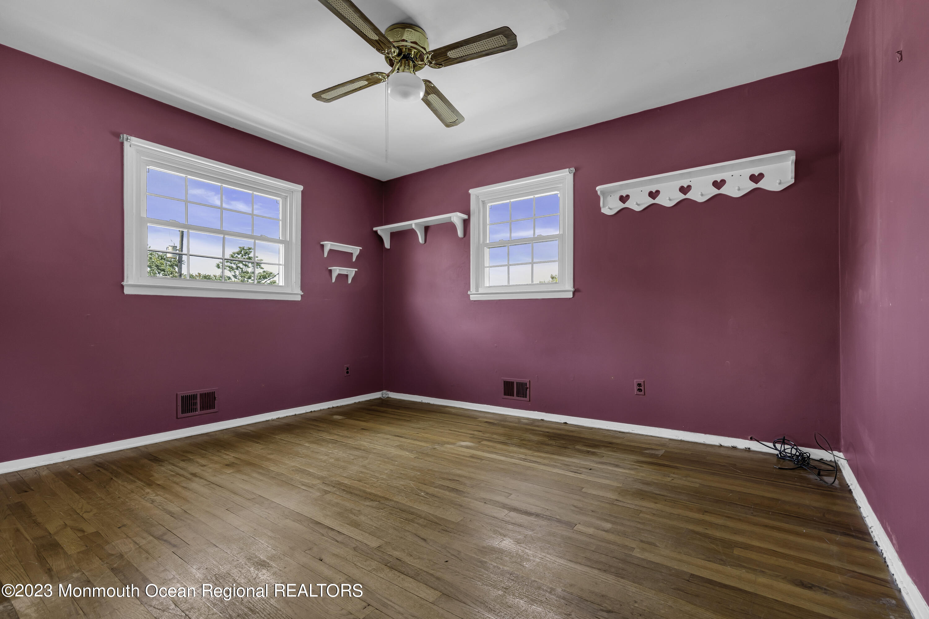 44 Danemar Drive Matawan, NJ 07747 - Photo 22 of 31 a view of empty room with wooden floor