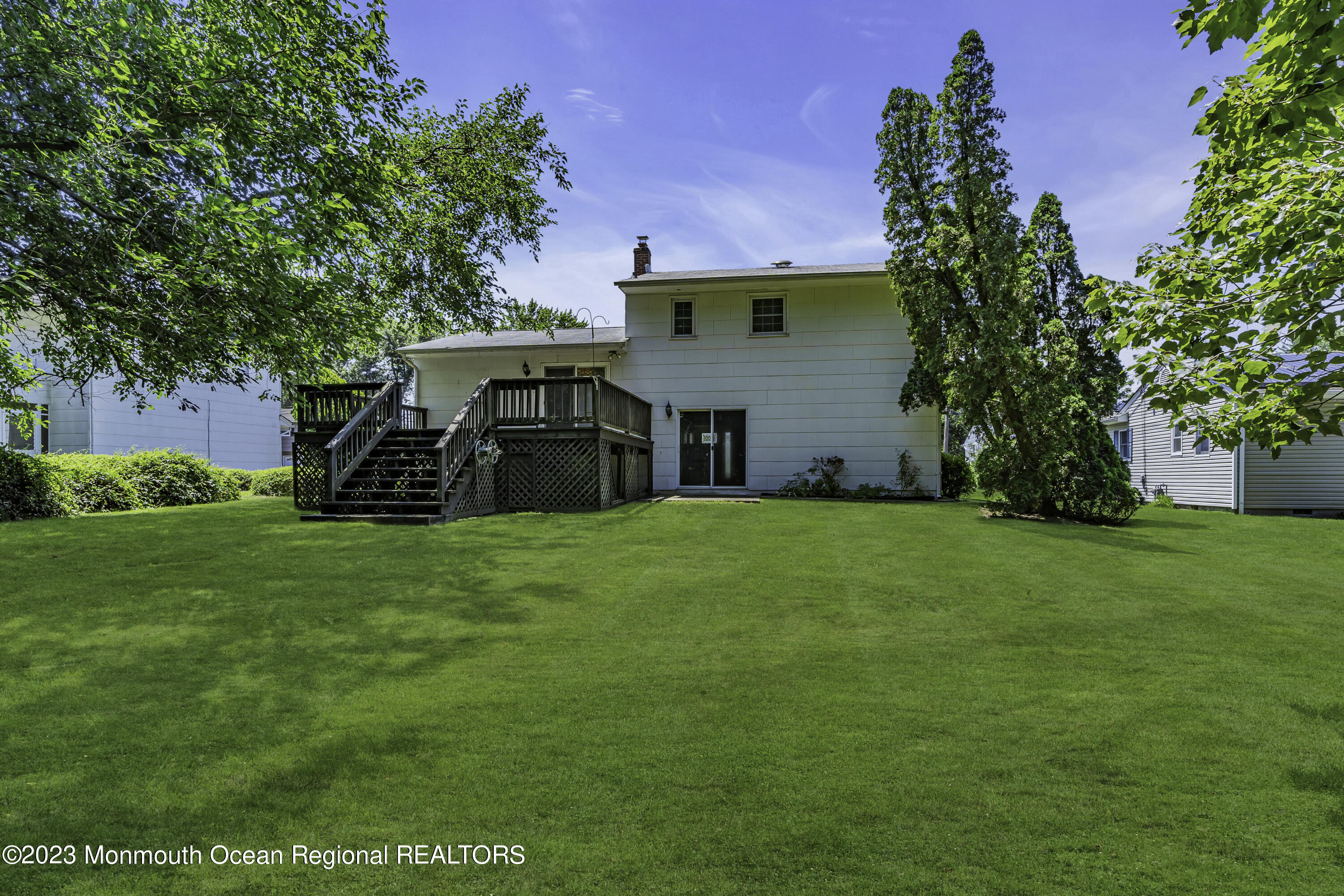 44 Danemar Drive Matawan, NJ 07747 - Photo 24 of 31 a view of a house with backyard and garden