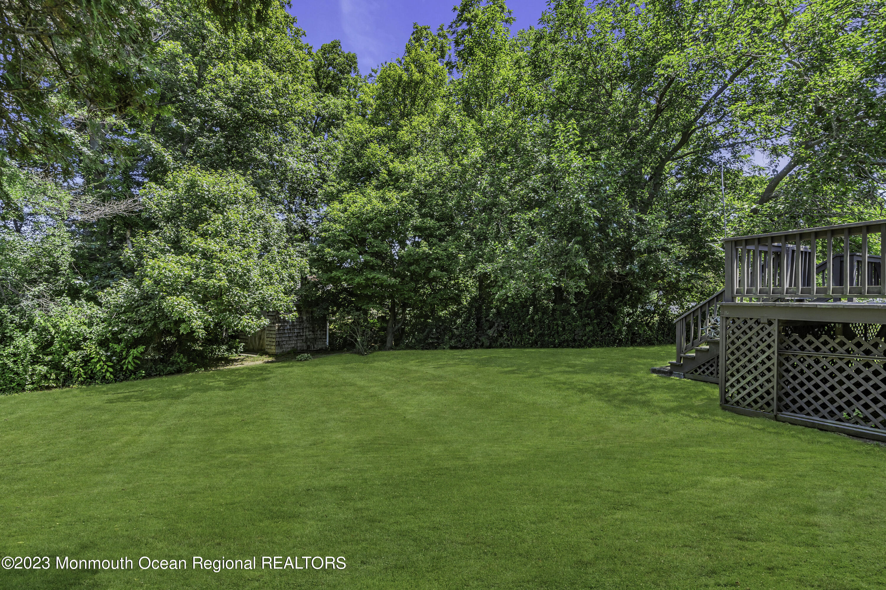 44 Danemar Drive Matawan, NJ 07747 - Photo 29 of 31 a view of a deck and yard