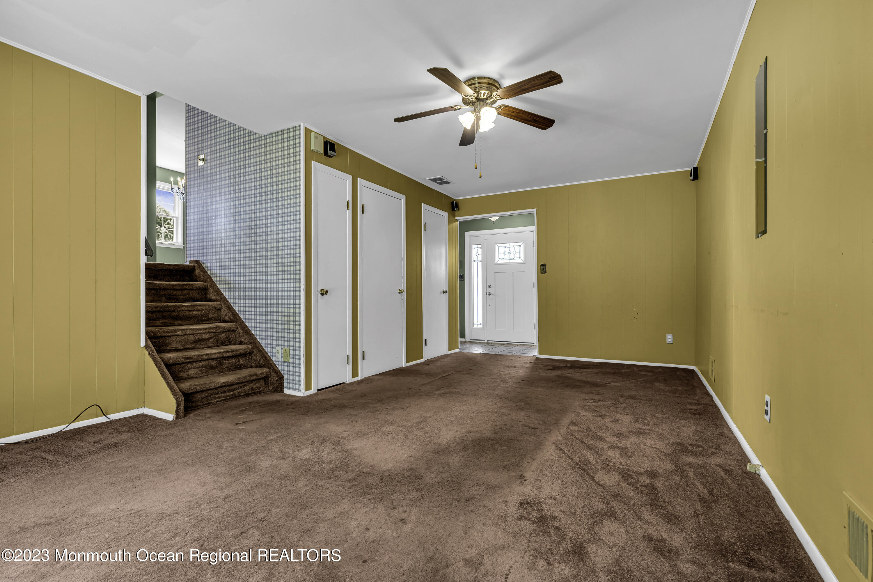 44 Danemar Drive Matawan, NJ 07747 - Photo 9 of 31 a view of an empty room with wooden floor
