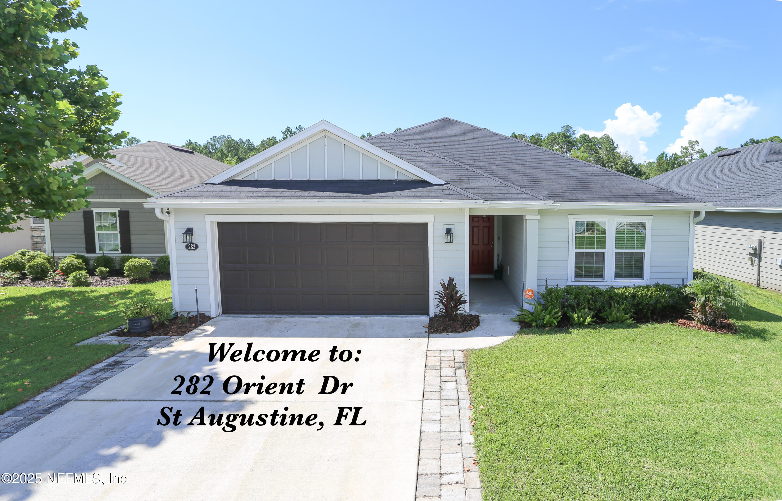 282 Orient Drive St. Augustine, FL 32092 - Photo 1 of 26 Front House Elevation with Welcome