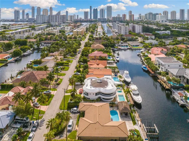 a living room with furniture window and wooden floor