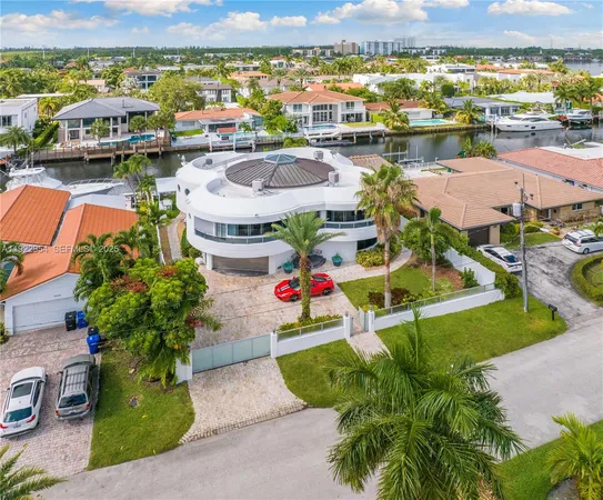 a living room with furniture window and wooden floor