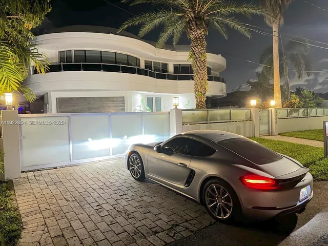 a view of a swimming pool with outdoor seating