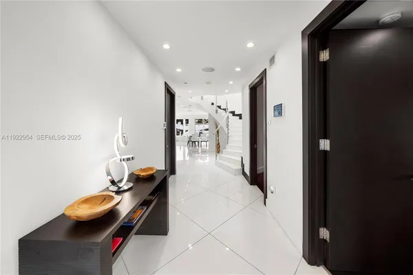 a bathroom with a sink and a large mirror