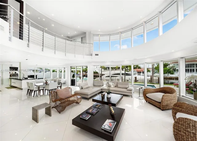 a livingroom with workspace and a couch