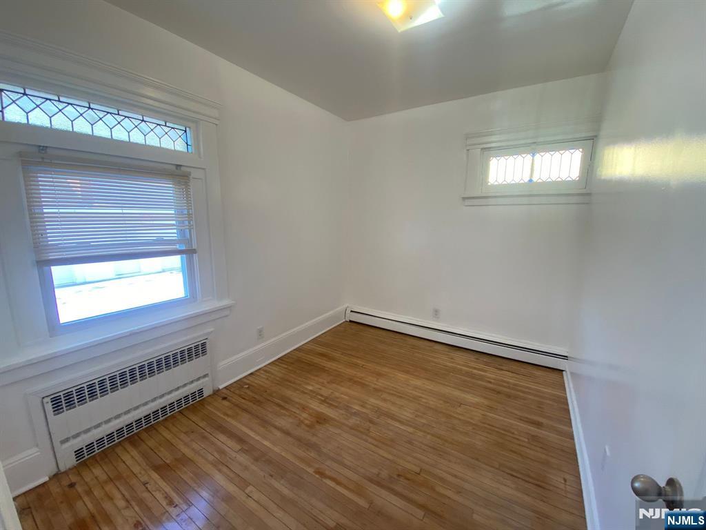 29 High Street, Unit 1R West Orange, NJ 07052 - Photo 15 of 19 a view of an empty room and window